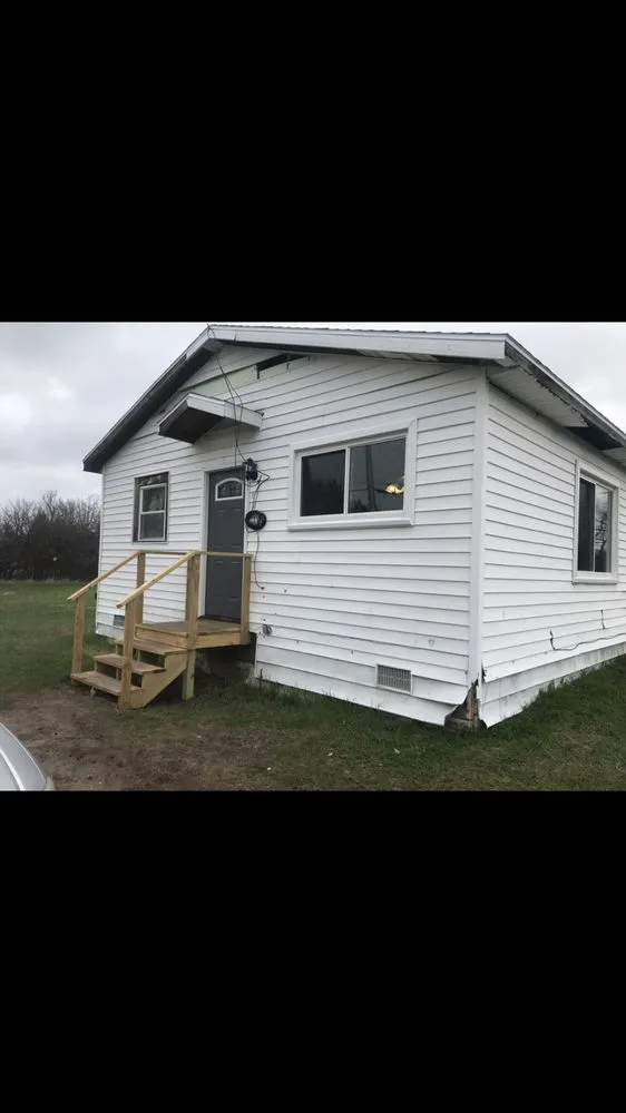 Licensed flat roof repair experts serving Delton, MI - Potter Seamless Gutters