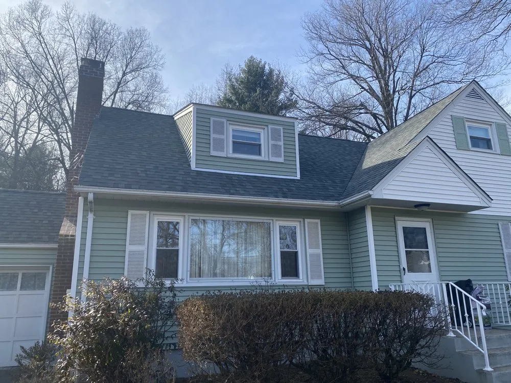 Slide of Poudink Construction and Roofing