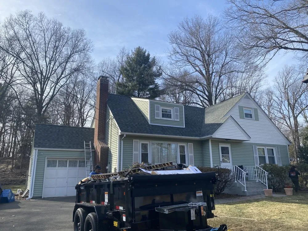 Slide of Poudink Construction and Roofing