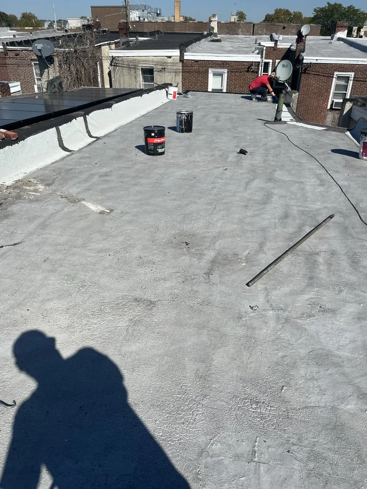 Slide of Poulterer Family Roofing