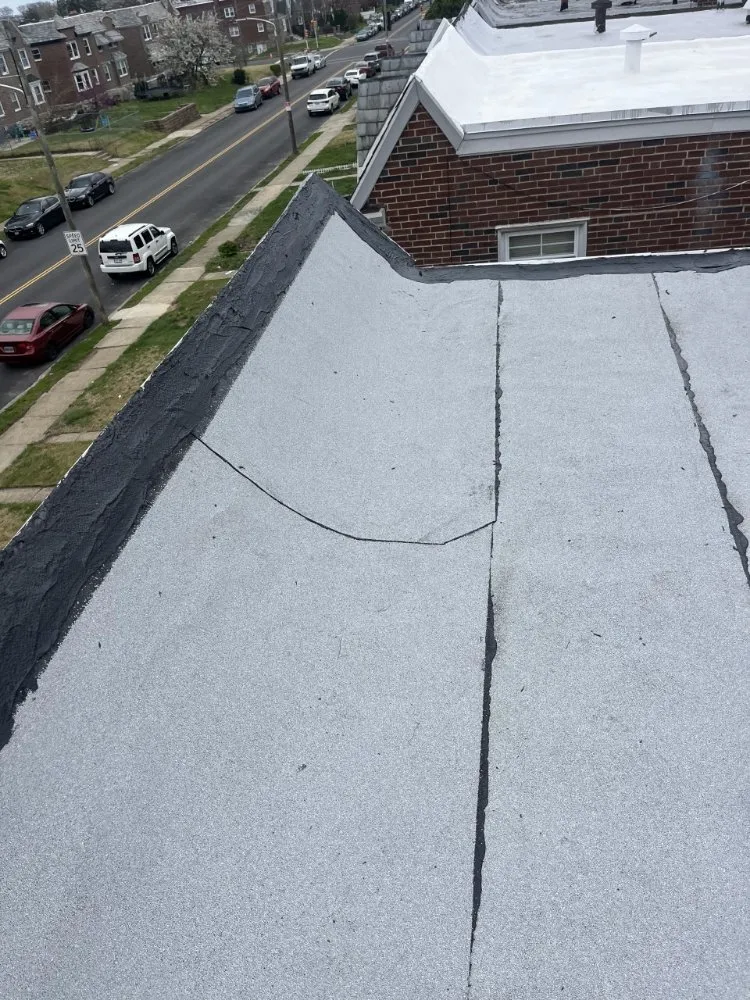 Slide of Poulterer Family Roofing