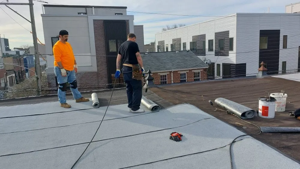 Slide of Poulterer Family Roofing