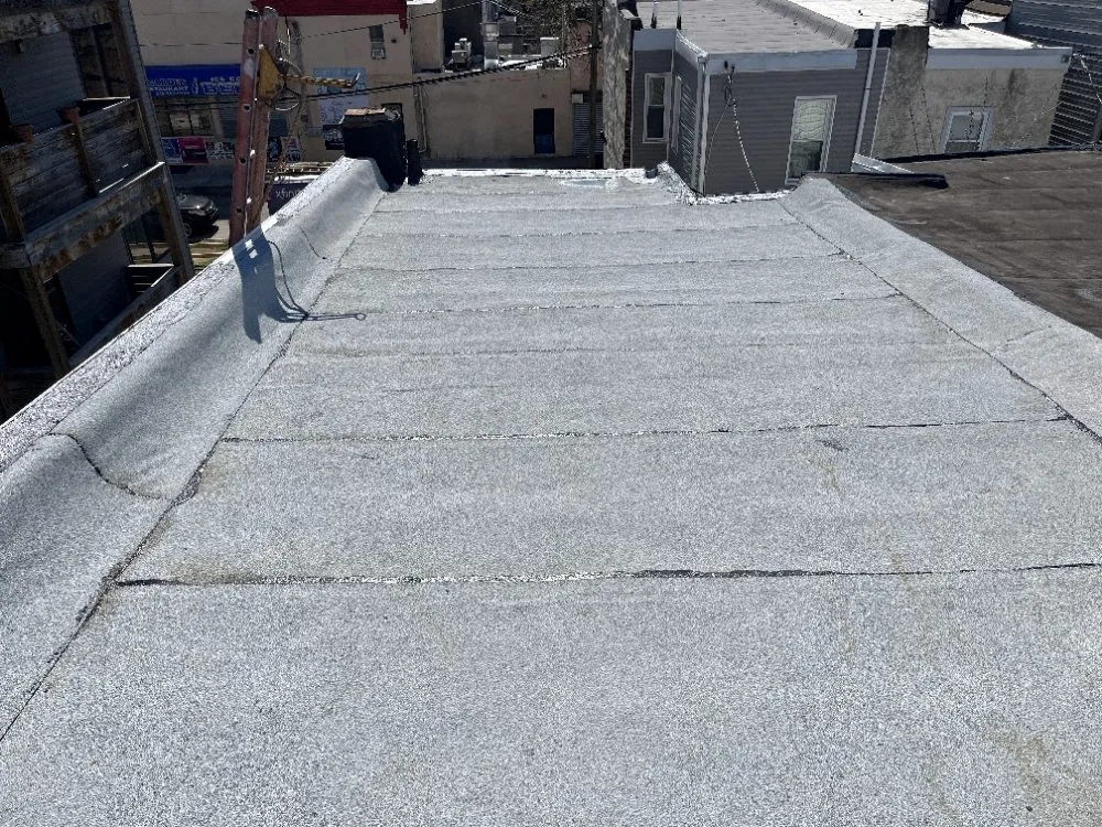 Slide of Poulterer Family Roofing