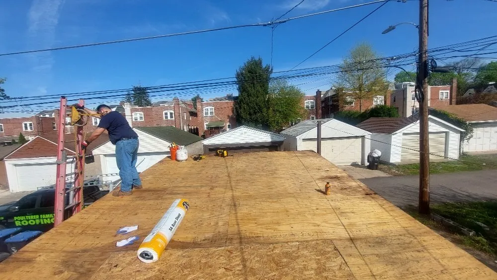 Slide of Poulterer Family Roofing