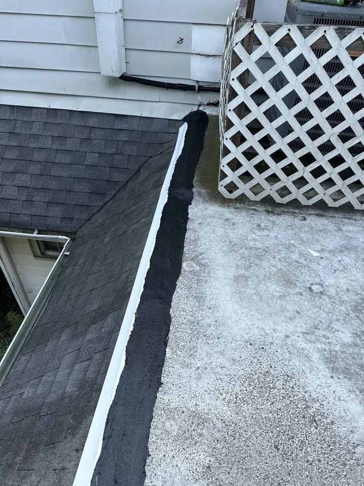 Slide of Poulterer Family Roofing