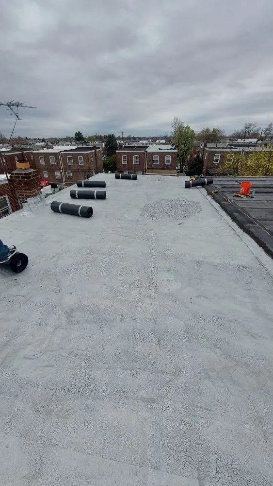 Slide of Poulterer Family Roofing
