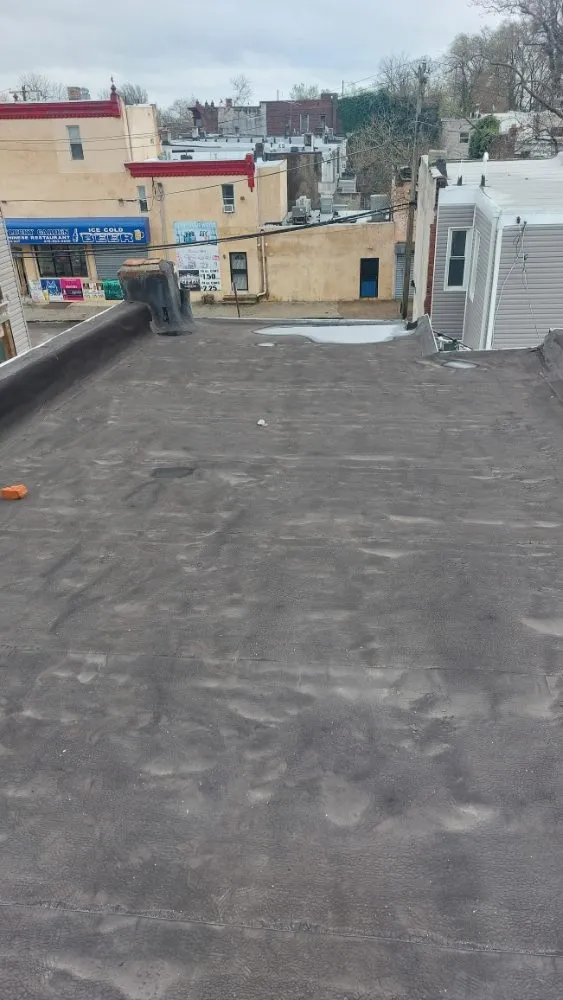 Slide of Poulterer Family Roofing