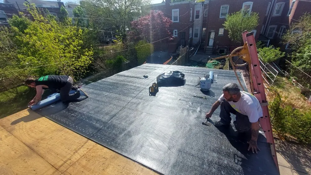 Slide of Poulterer Family Roofing