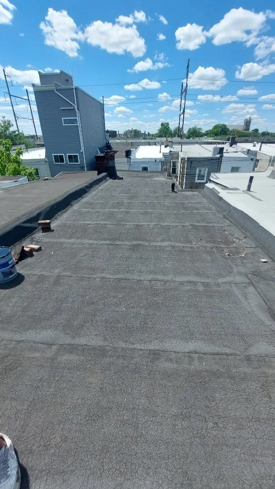 Slide of Poulterer Family Roofing