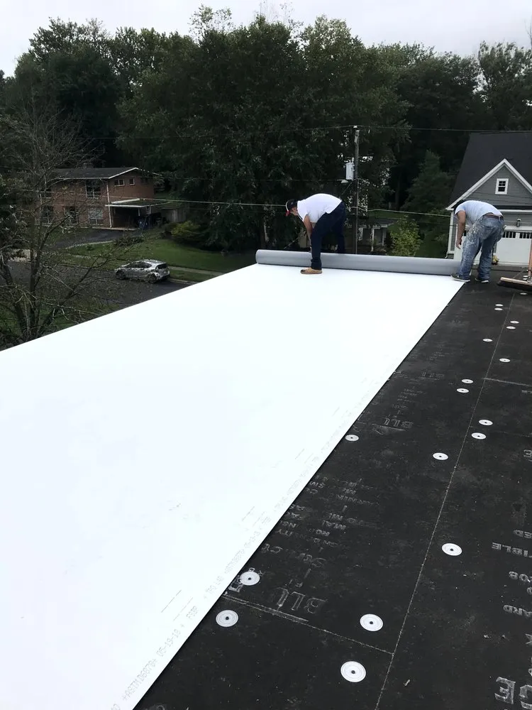 Slide of Power House Roofing