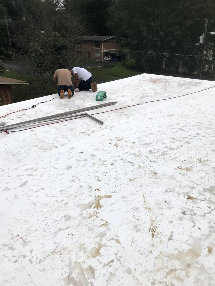 Slide of Power House Roofing