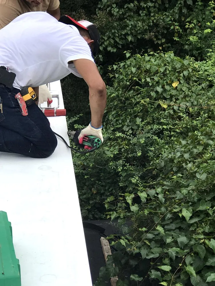 Slide of Power House Roofing