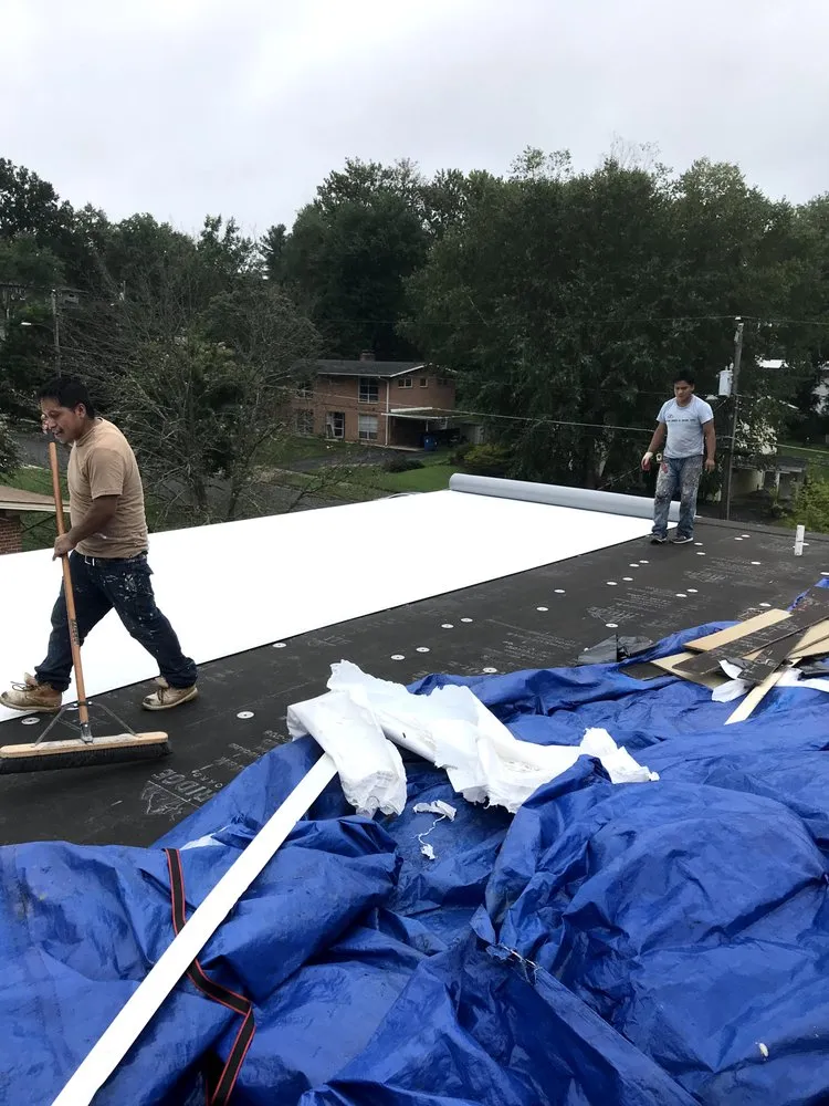 Slide of Power House Roofing