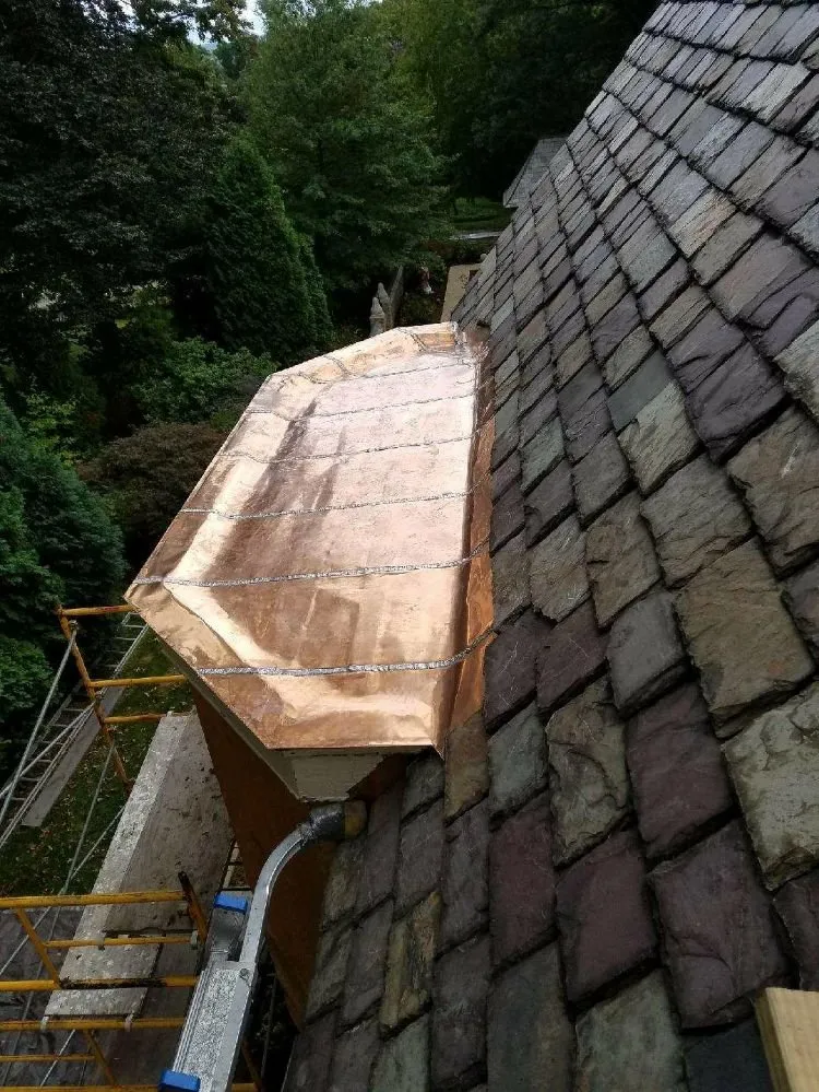 Expert metal roofing installation after storm damage in Jamestown, PA by PPM Slate Roofing