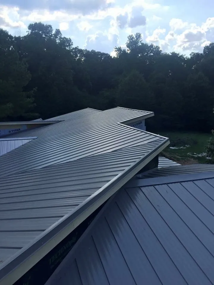 Slide of Precipice Roofing Solutions