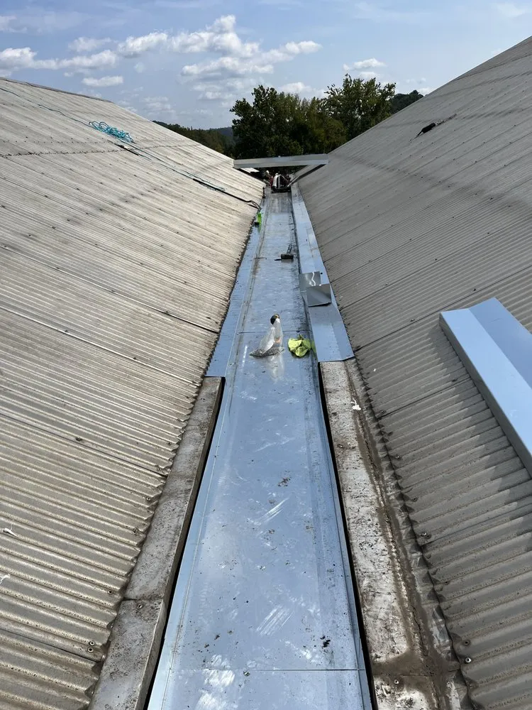 Slide of Precision Commercial Roof Repair