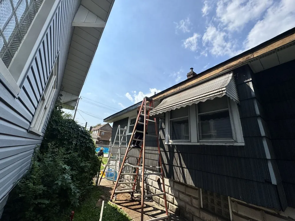 Slide of Precision Exteriors & Restoration