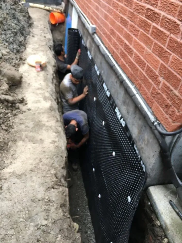 Slide of Precision Paving and Masonry Corp