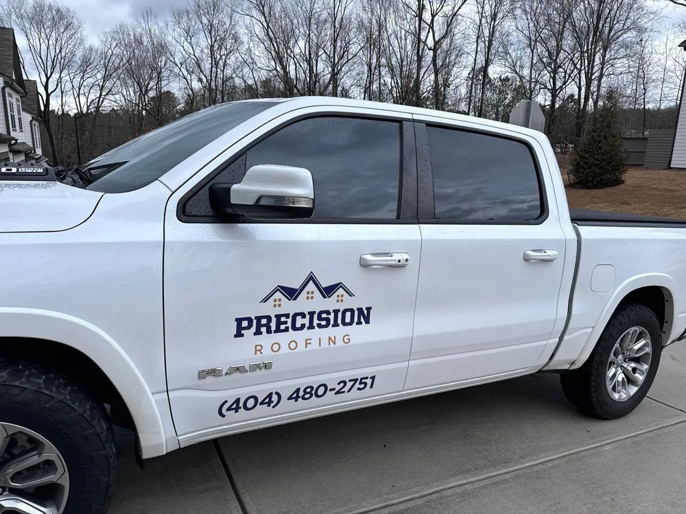 Slide of Precision Roofing