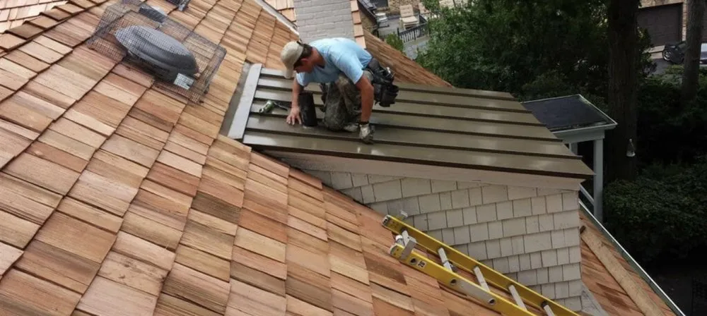 Slide of Precision Roofing and Paving