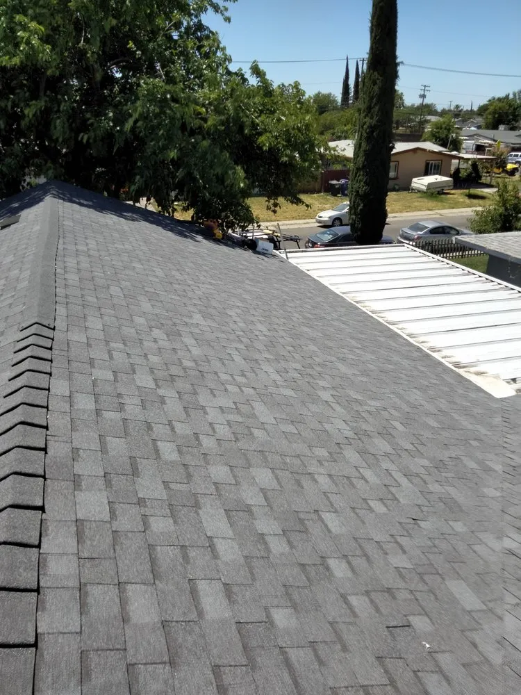 Slide of Precision Roofing