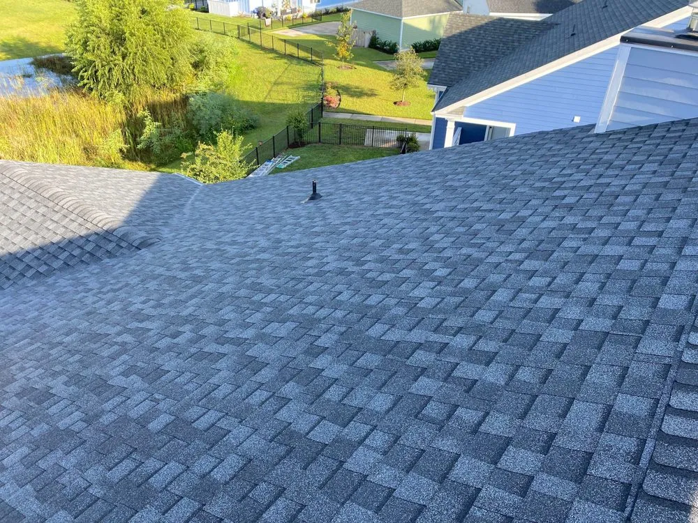 Slide of Precision Roofing