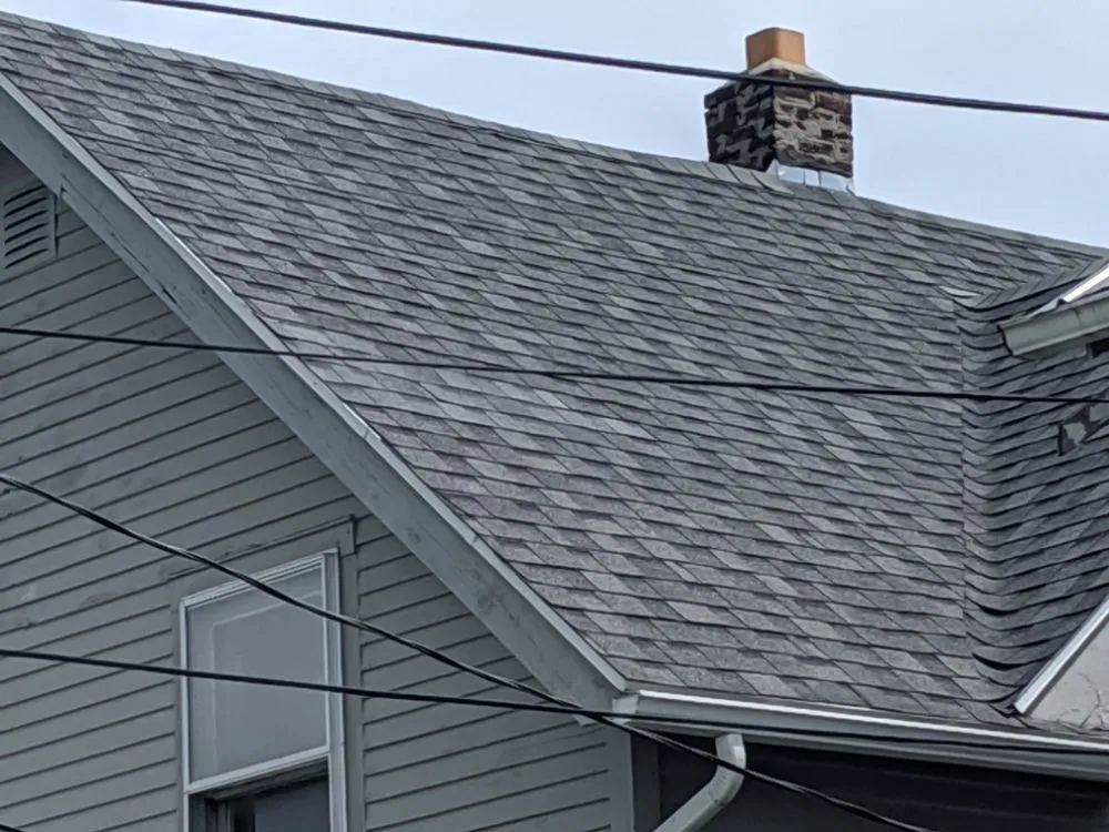 Slide of Precision Roofing