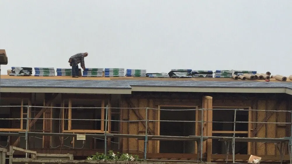 Slide of Precision Roofing