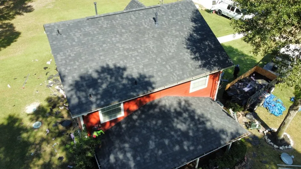 Licensed flat roof repair after storm damage across Porter, TX - Premier Image Roofing & Construction