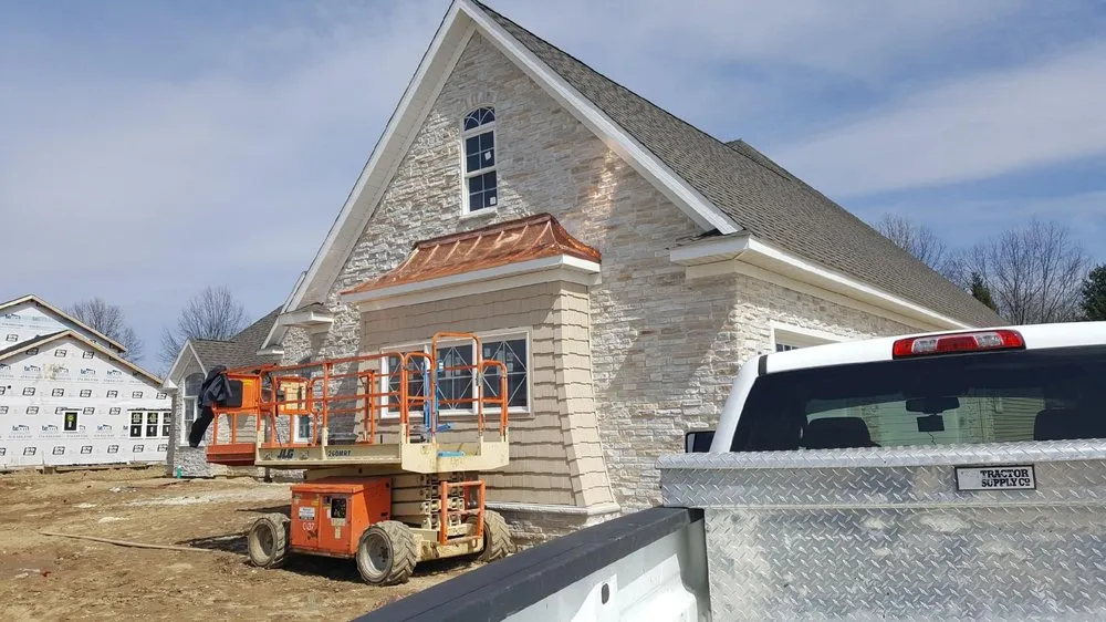 Slide of Premier Roofing & Construction