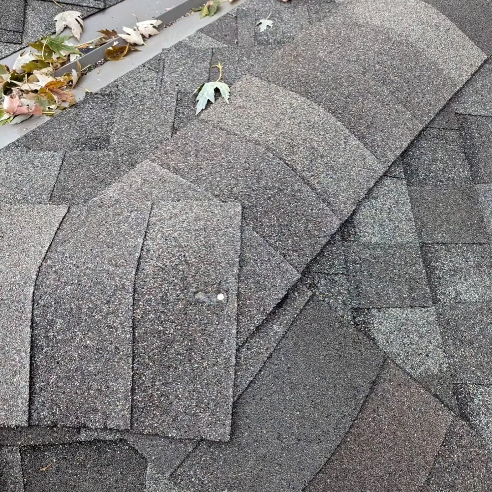 Slide of Premier Roofing Company