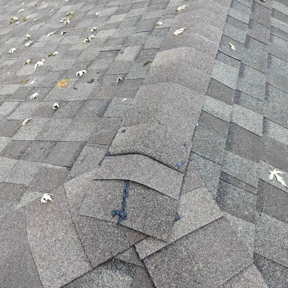 Slide of Premier Roofing Company