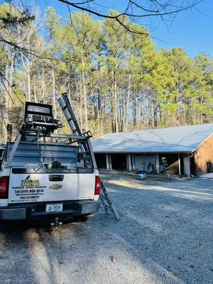 Premier Roofing Sheet Metal & Construction Logo