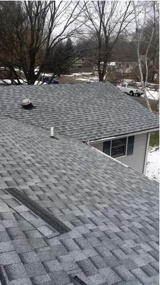 Slide of Premiere Roofing & Construction