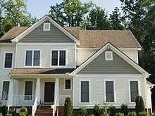 Expert flat roof repair in Highland Charter Township, MI by Premium Restoration and Roofing