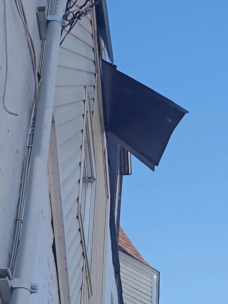 Slide of Premo's roofing