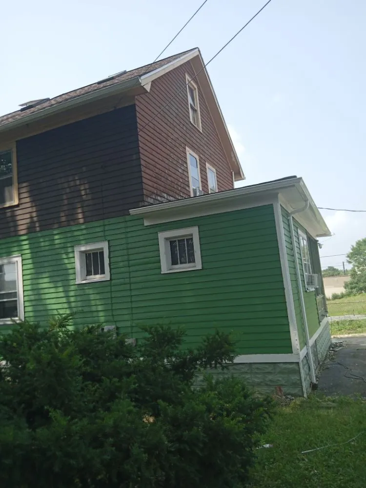 Slide of Premo's roofing