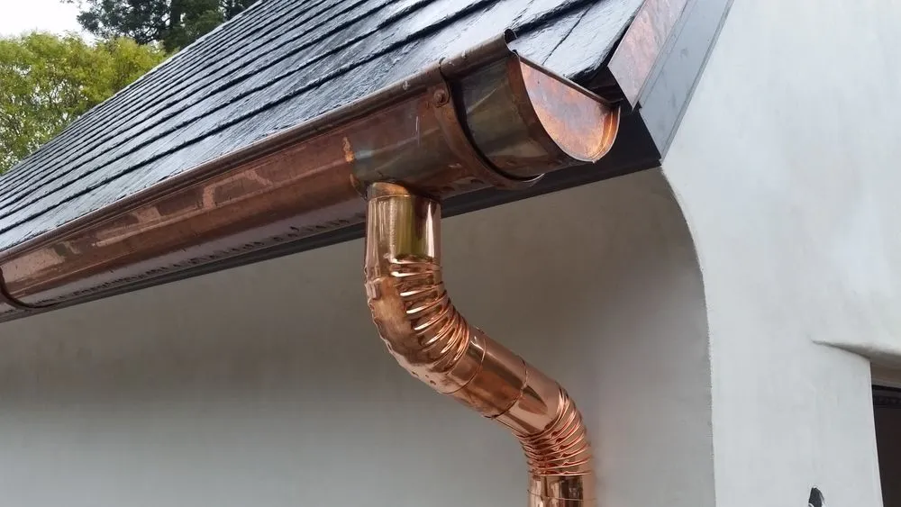 Slide of Prestige Gutters/Roofing