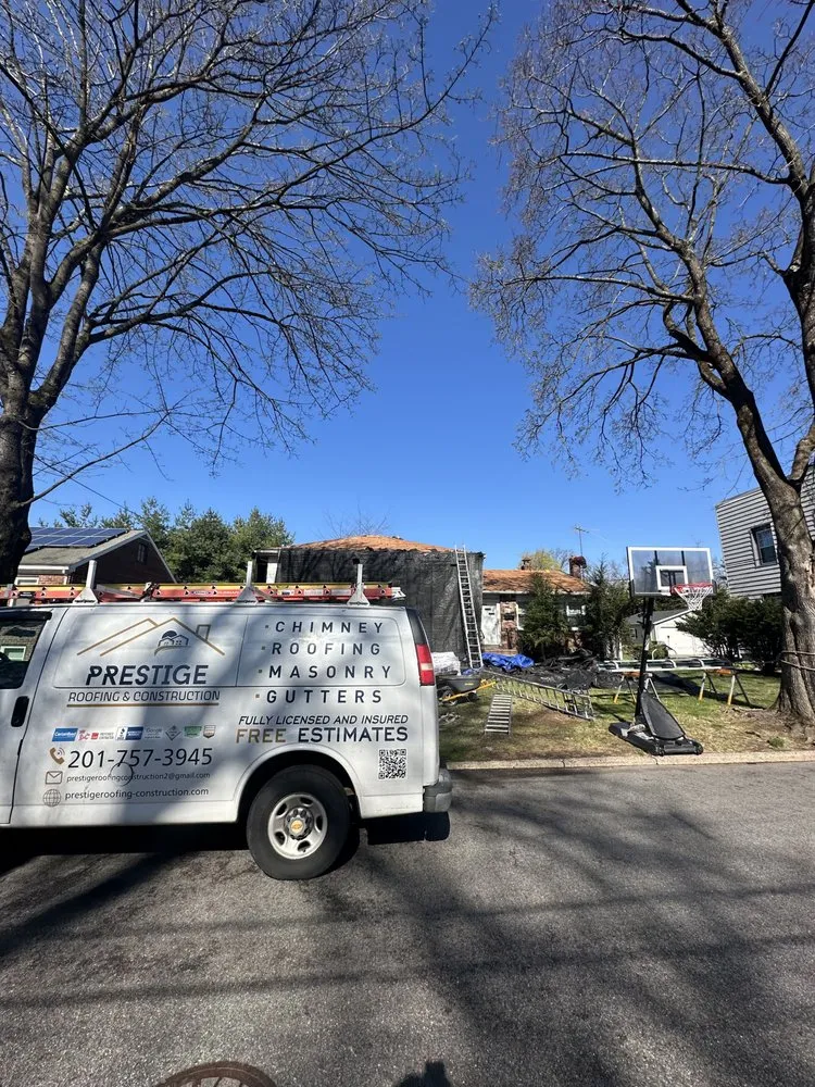 Slide of Prestige Roofing & Construction