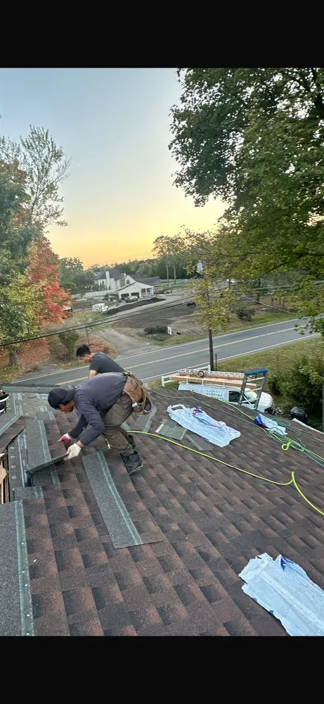 Slide of Prestige Roofing & Construction