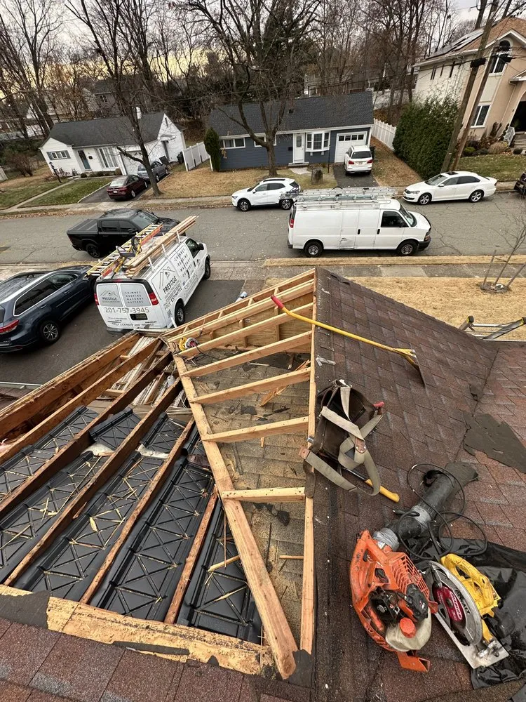 Slide of Prestige Roofing & Construction