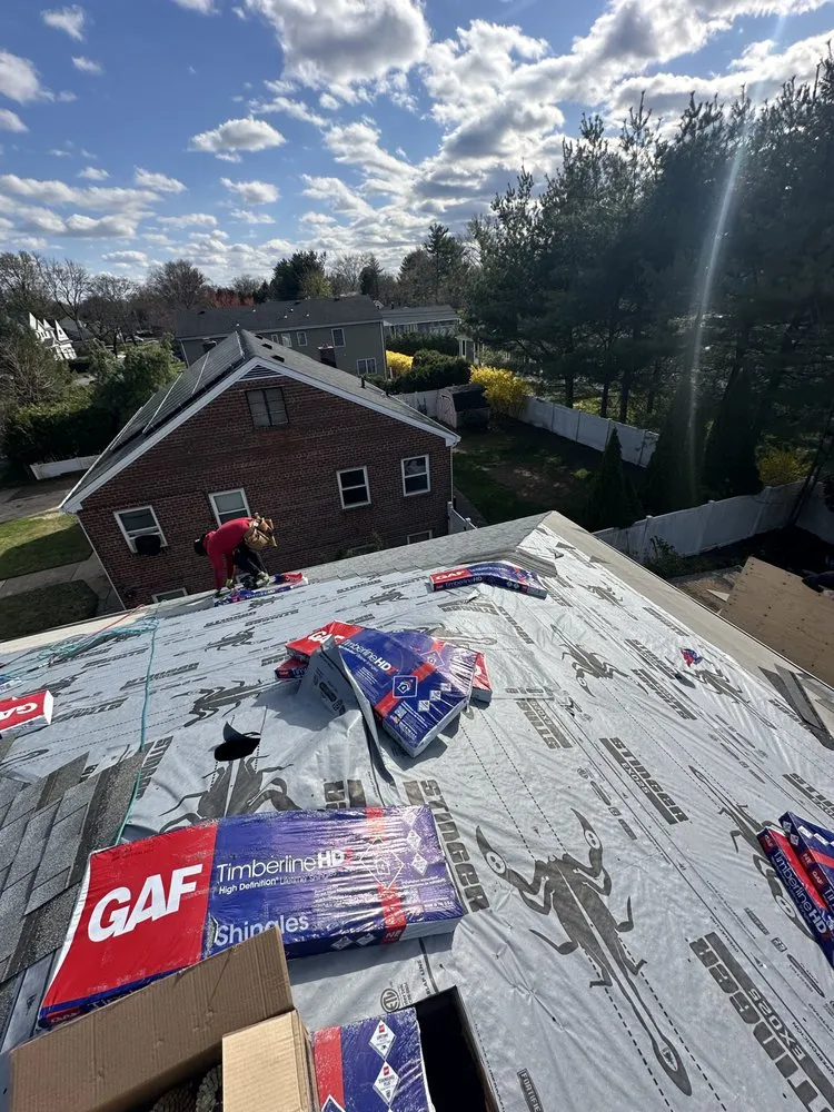 Slide of Prestige Roofing & Construction