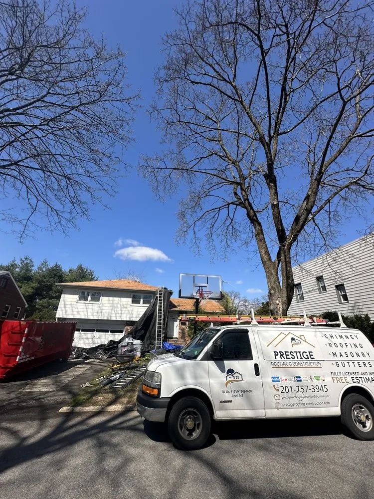 Slide of Prestige Roofing & Construction