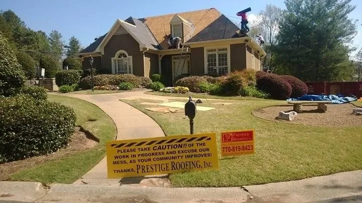 Slide of Prestige Roofing & Exteriors