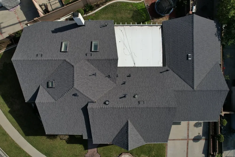 Slide of Prestige Roofing