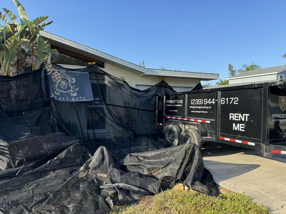 Slide of Prestige Roofing Company