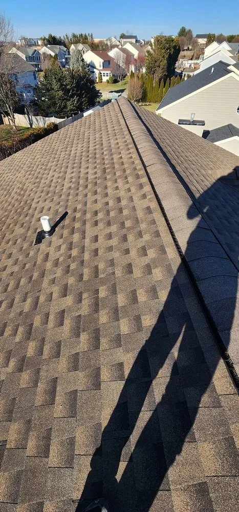 Slide of Prestige Roofing