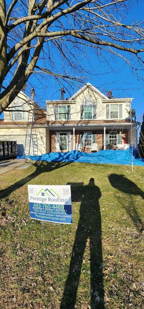 Slide of Prestige Roofing