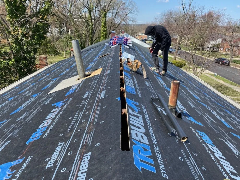 Slide of Prestige Roofing