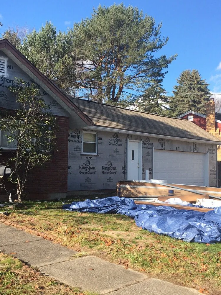 Slide of Prestige Roofing